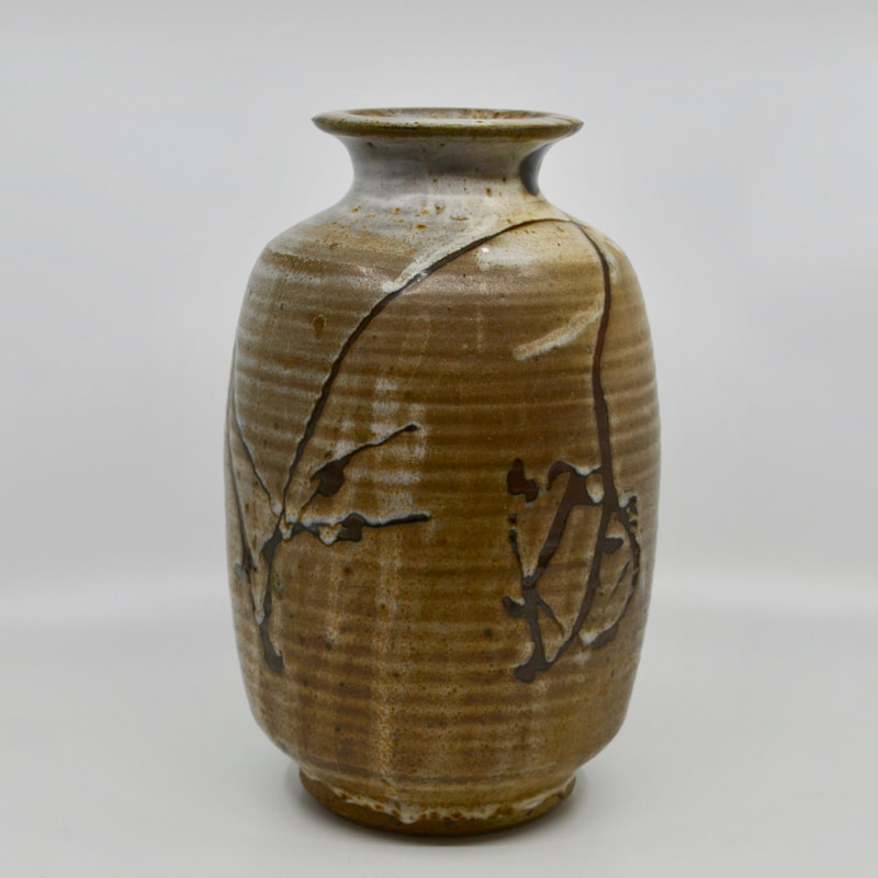 Beautiful vase by Wayne Ngan made in the mid 1060s and featuring early versions of his signature brush stroke decor.