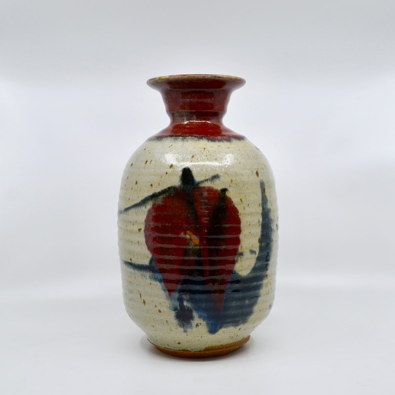 Colourful tall vase made by Wayne Ngan in the mid 1960s.