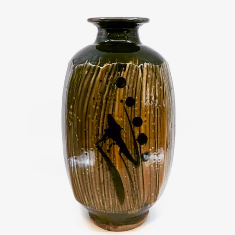 One of the finest examples of Wayne Ngan pottery you will ever find.